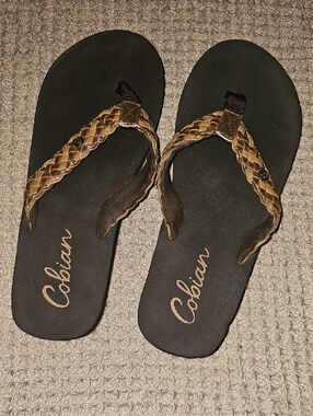 Cobian Braided Tan and Black Women's Flip Flops